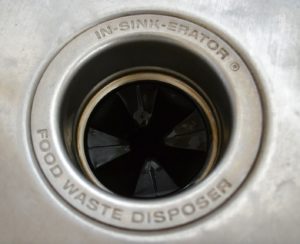 A kitchen sink garbage disposal